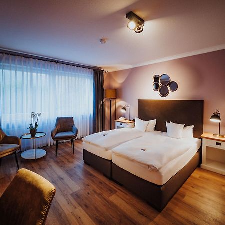 Antik-Hotel Eichenhof Бад-Зальцуфлен Экстерьер фото